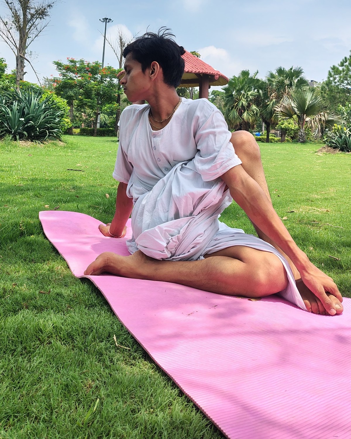 Devine Yoga live class and founder Dev guiding stress-relief yoga