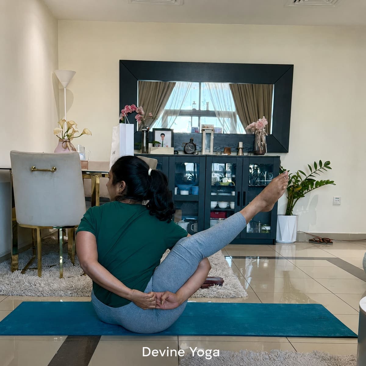 Devine Yoga student 1 practising a pose at home