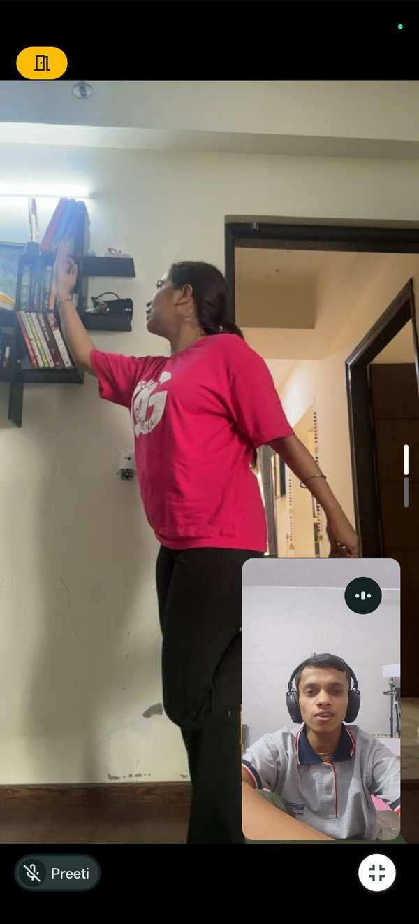 Devine Yoga student 5 practising a pose at home